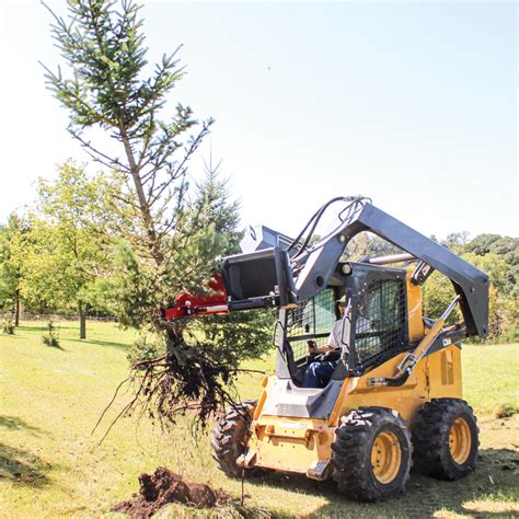 pushing down trees with skid steer|removing trees with skid steer.